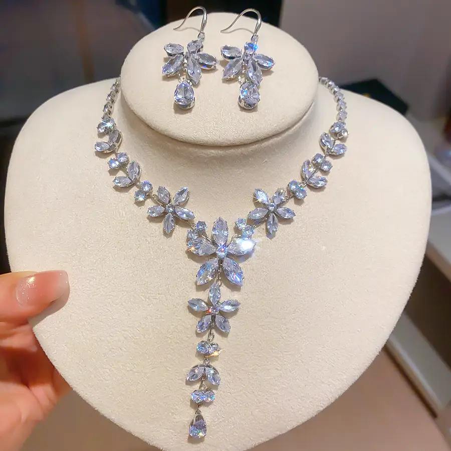 European and American style, featuring diamond-studded teardrop and geometric earrings and a necklace set, with a retro, courtly aesthetic, making it a fashionable and versatile accessory for women
