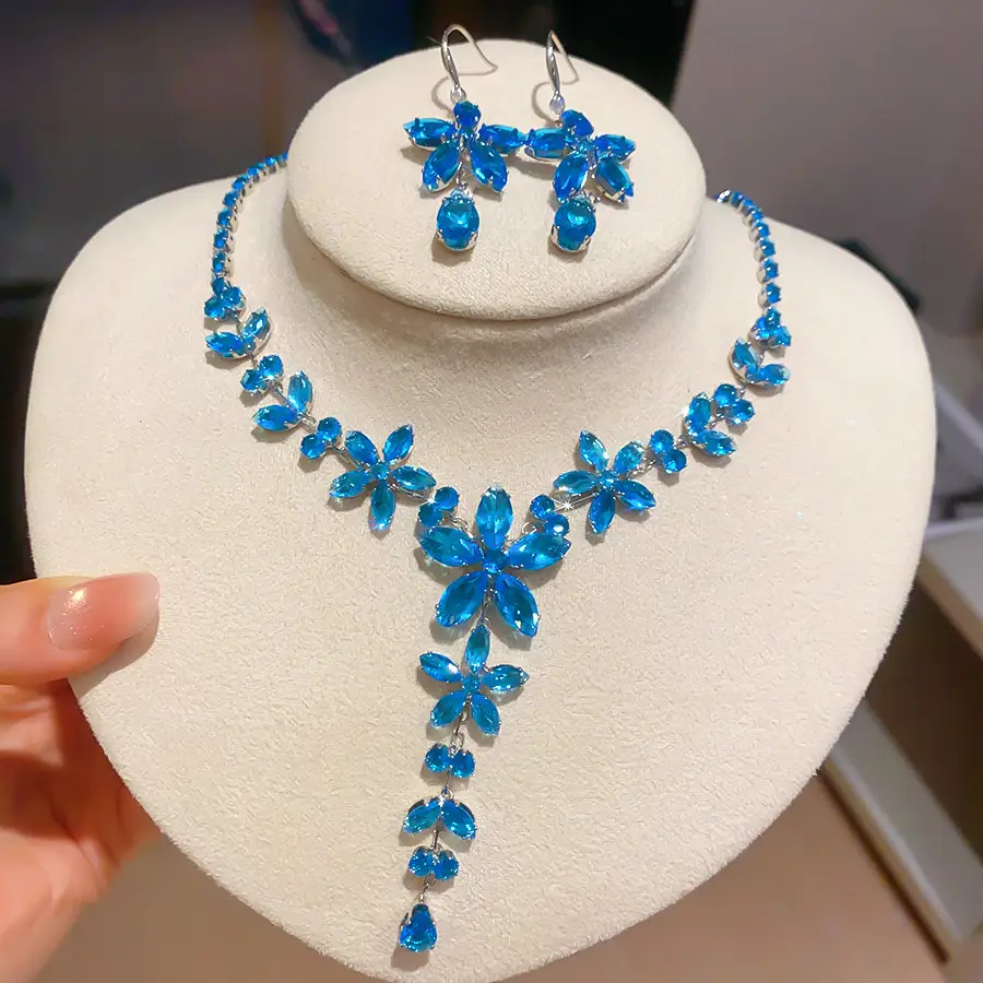 European and American style, featuring diamond-studded teardrop and geometric earrings and a necklace set, with a retro, courtly aesthetic, making it a fashionable and versatile accessory for women