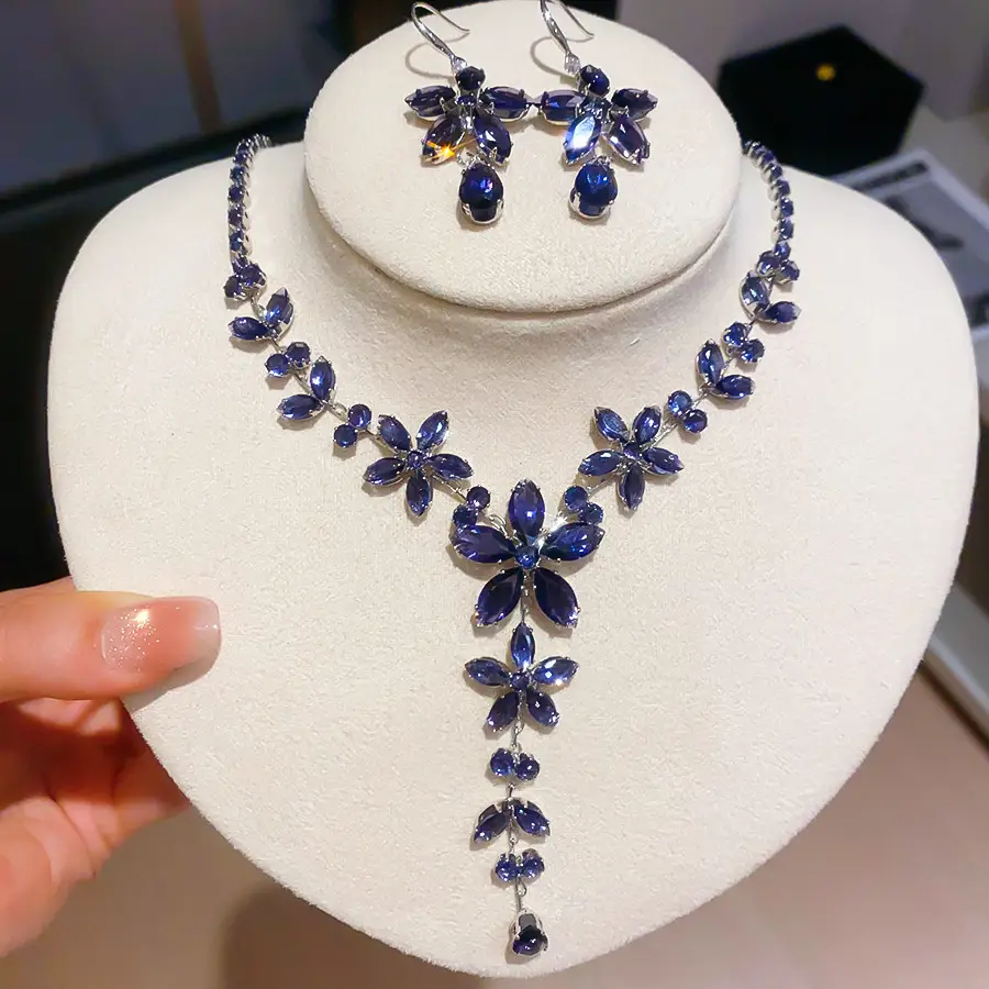 European and American style, featuring diamond-studded teardrop and geometric earrings and a necklace set, with a retro, courtly aesthetic, making it a fashionable and versatile accessory for women