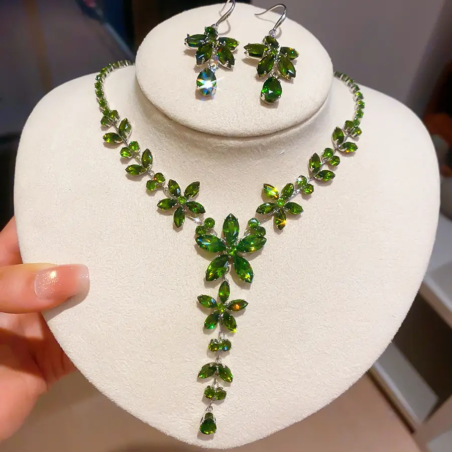 European and American style, featuring diamond-studded teardrop and geometric earrings and a necklace set, with a retro, courtly aesthetic, making it a fashionable and versatile accessory for women