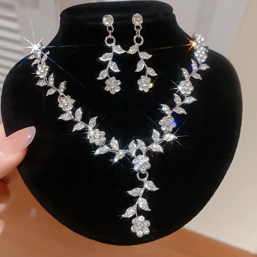 European and American style, featuring diamond-studded teardrop and geometric earrings and a necklace set, with a retro, courtly aesthetic, making it a fashionable and versatile accessory for women