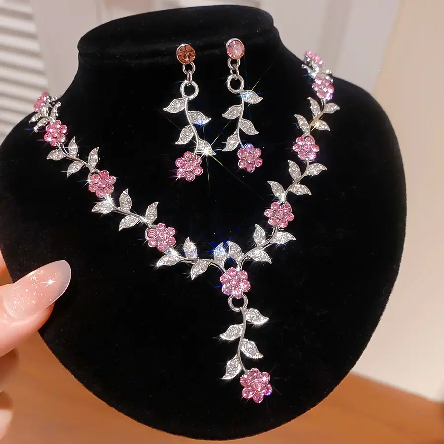 European and American style, featuring diamond-studded teardrop and geometric earrings and a necklace set, with a retro, courtly aesthetic, making it a fashionable and versatile accessory for women