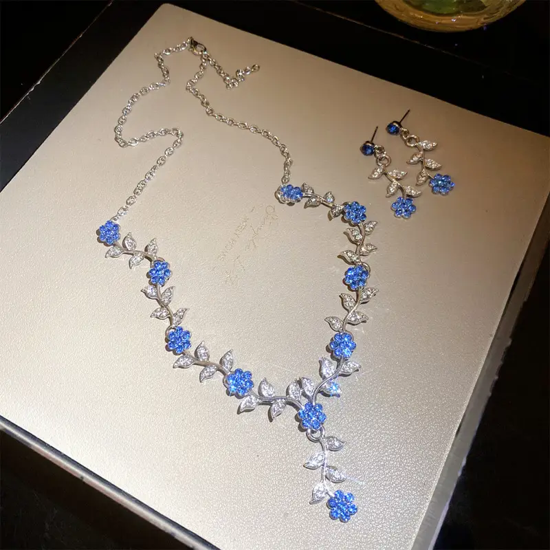 European and American style, featuring diamond-studded teardrop and geometric earrings and a necklace set, with a retro, courtly aesthetic, making it a fashionable and versatile accessory for women