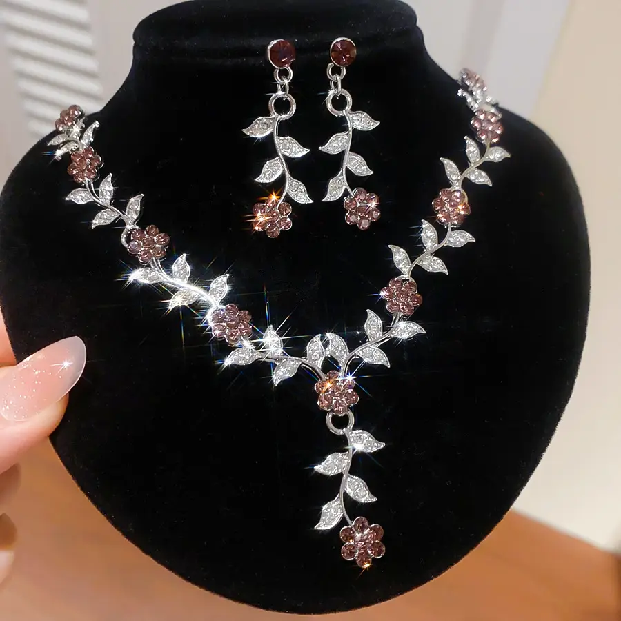 European and American style, featuring diamond-studded teardrop and geometric earrings and a necklace set, with a retro, courtly aesthetic, making it a fashionable and versatile accessory for women