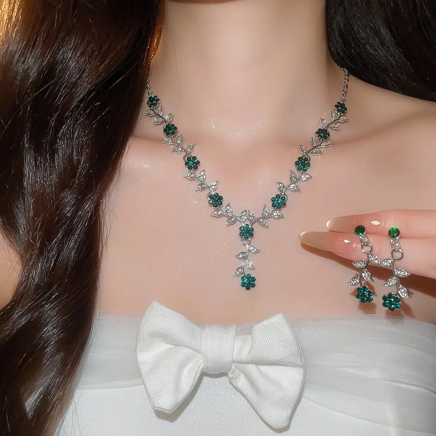 European and American style, featuring diamond-studded teardrop and geometric earrings and a necklace set, with a retro, courtly aesthetic, making it a fashionable and versatile accessory for women