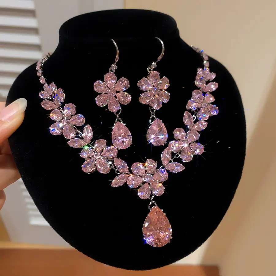 European and American style, featuring diamond-studded teardrop and geometric earrings and a necklace set, with a retro, courtly aesthetic, making it a fashionable and versatile accessory for women