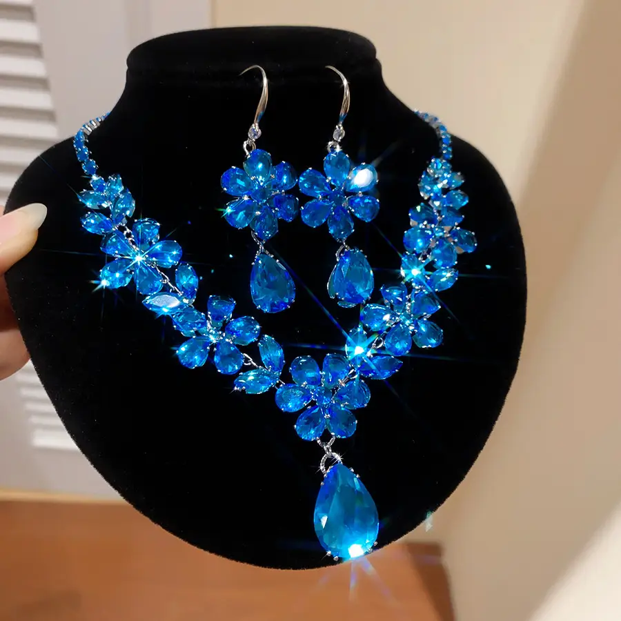 European and American style, featuring diamond-studded teardrop and geometric earrings and a necklace set, with a retro, courtly aesthetic, making it a fashionable and versatile accessory for women