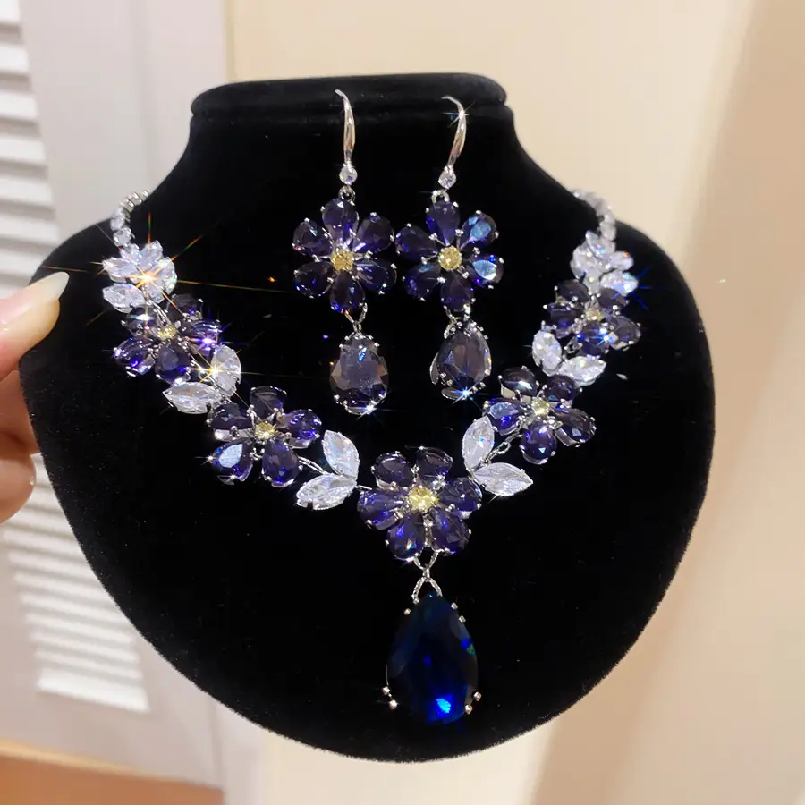 European and American style, featuring diamond-studded teardrop and geometric earrings and a necklace set, with a retro, courtly aesthetic, making it a fashionable and versatile accessory for women