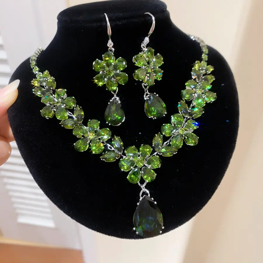 European and American style, featuring diamond-studded teardrop and geometric earrings and a necklace set, with a retro, courtly aesthetic, making it a fashionable and versatile accessory for women