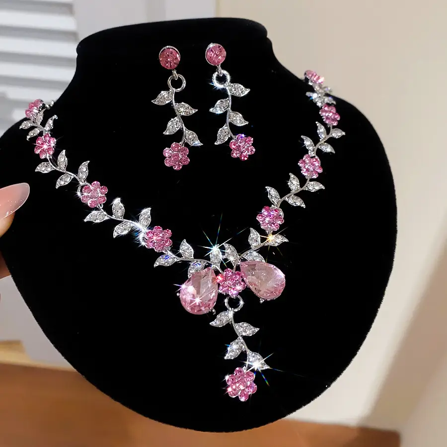 European and American style, featuring diamond-studded teardrop and geometric earrings and a necklace set, with a retro, courtly aesthetic, making it a fashionable and versatile accessory for women