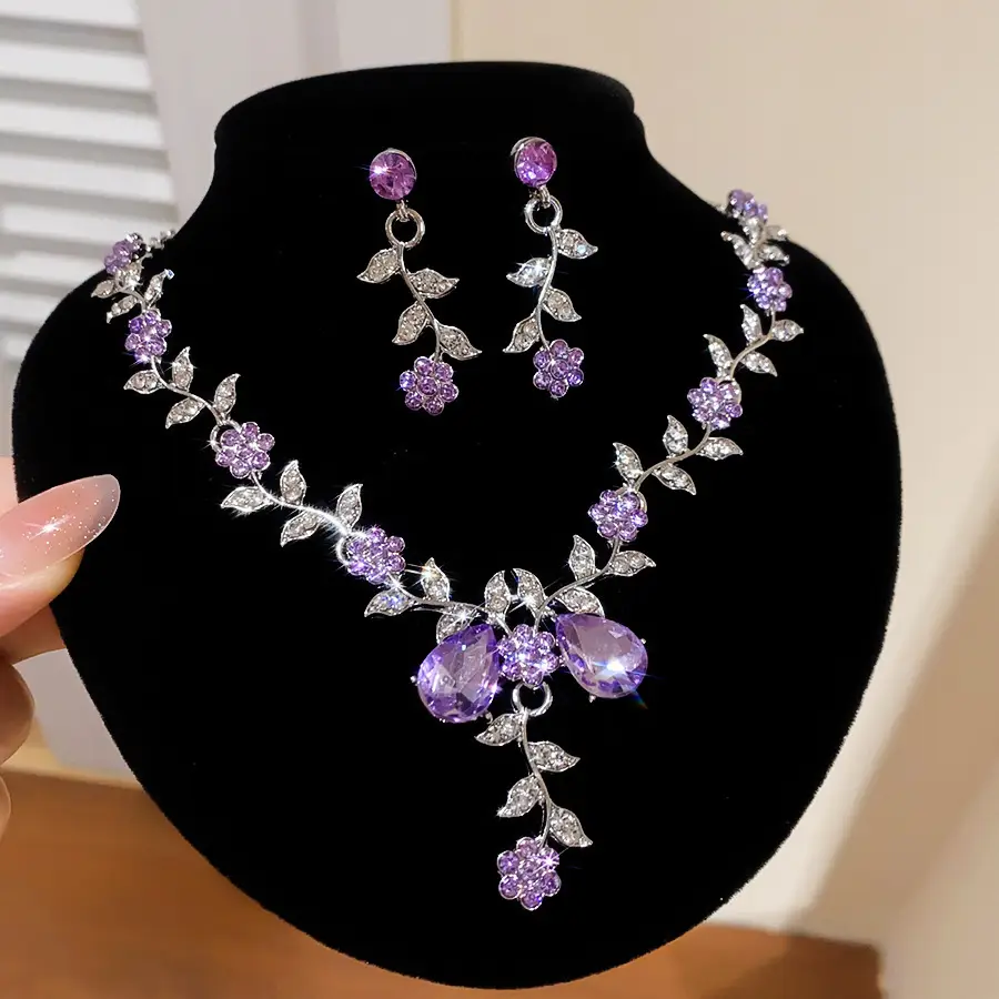 European and American style, featuring diamond-studded teardrop and geometric earrings and a necklace set, with a retro, courtly aesthetic, making it a fashionable and versatile accessory for women