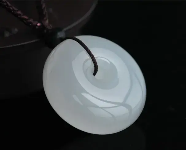 Xinjiang White Jade Peace Buckle Pendant — feature 2
