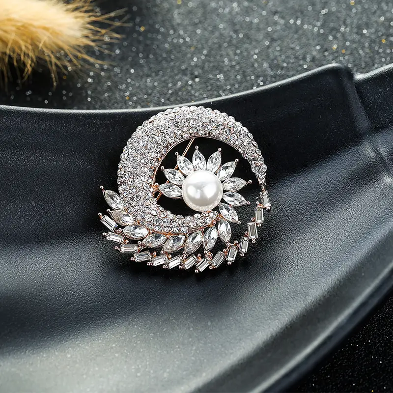 Elegant Crystal Rotating Brooch with Pearl & Blue Accents - Image 4