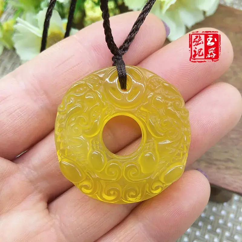 Yellow Jade Pendant with Double Buckle Design — feature 31