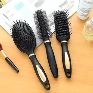 Anti-static hair comb with cushion ribs for curly hair — feature 16