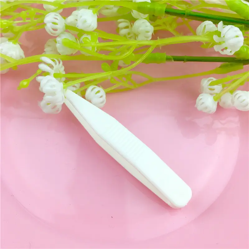 White Plastic Tweezers for Eyelid Sticker Application - Image 4