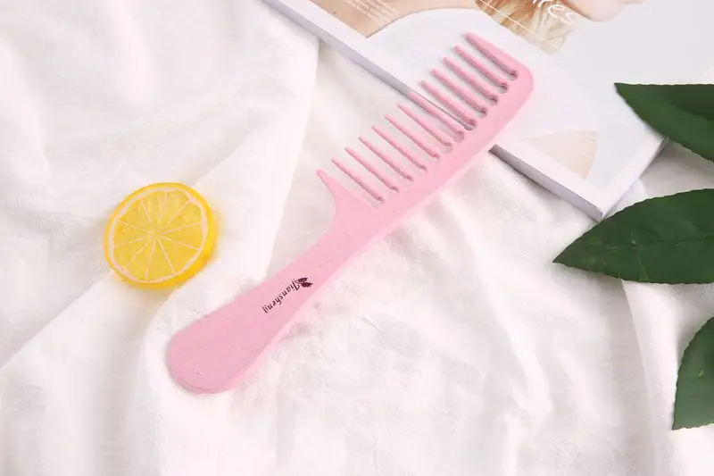 Pink Multi-Functional Hair Comb for Daily Use