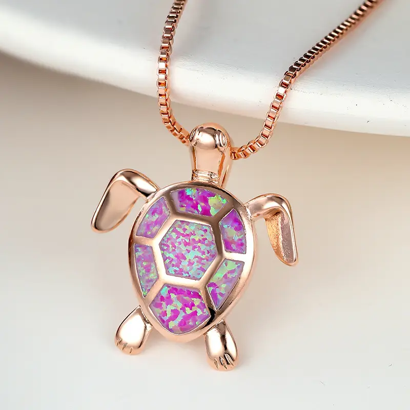 Turtle Pendant Necklace with Heart of the Ocean Design