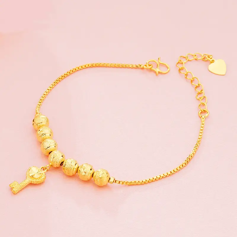 Gold Plated Snake Bone Chain Bracelet with Key & Compass - Image 11