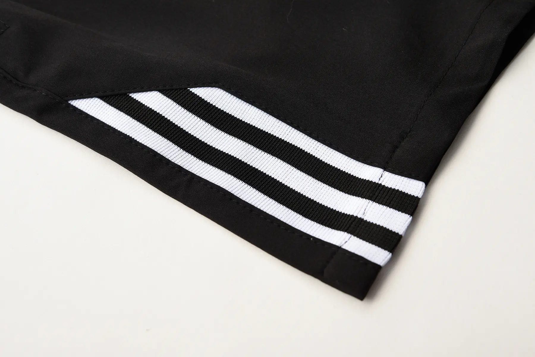 Men's Black Five-Point Shorts with Neon Stripes — feature 4