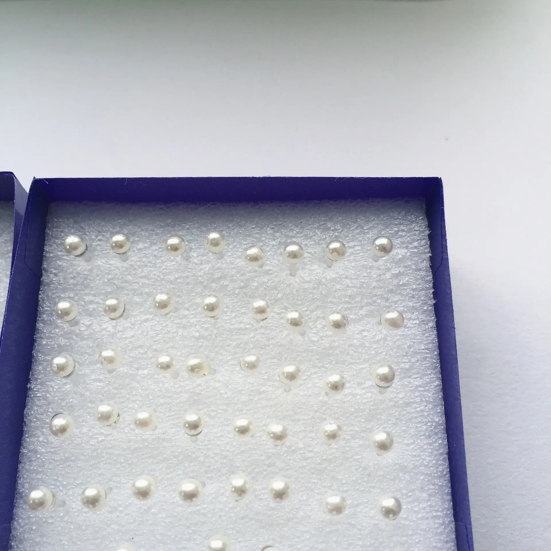 Pearl Earrings with Needle-Sized Design