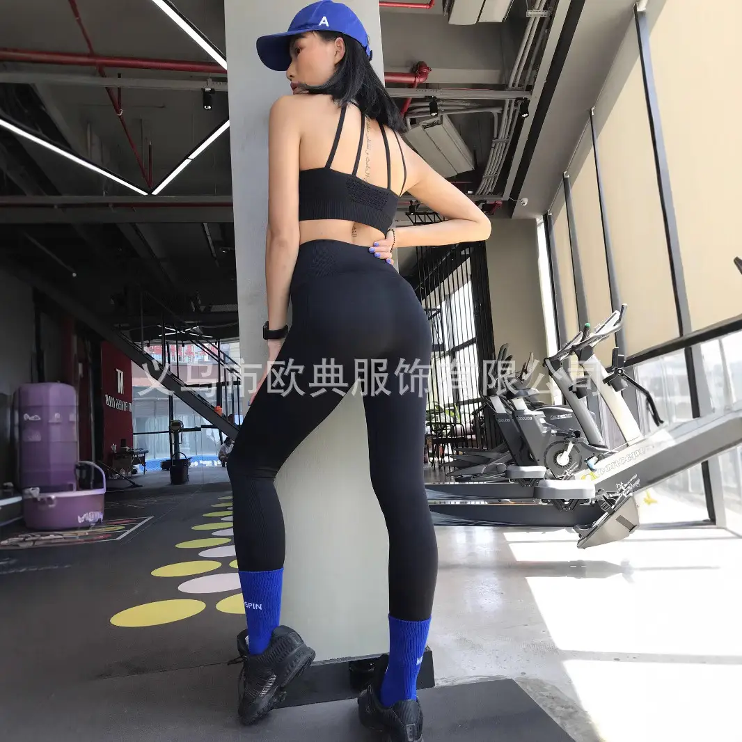 Red Seamless Fitness Pants for Women with White Sneakers - Image 5