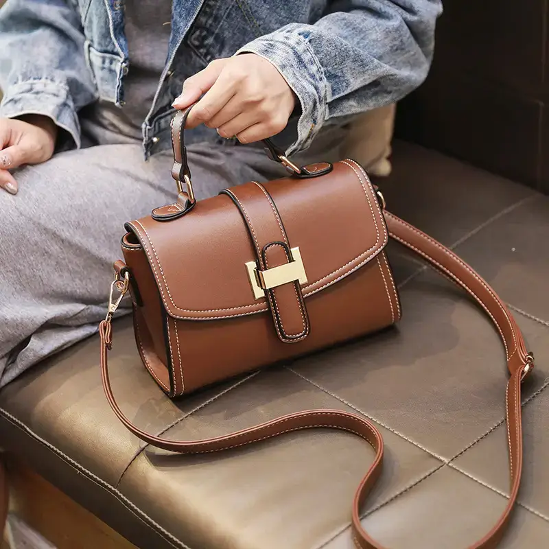 Women's Red Leather Crossbody Bag with Gold Clasp