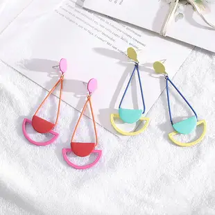 Golden Spring Earrings with Star and Bell Design — feature 1