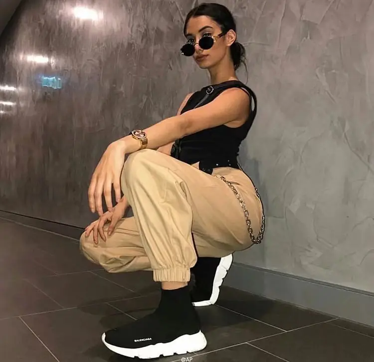 Women's White Crossbody Belt Pants with Black Boots — feature 17