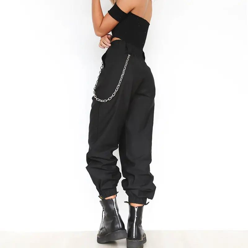 Women's White Crossbody Belt Pants with Black Boots — feature 6