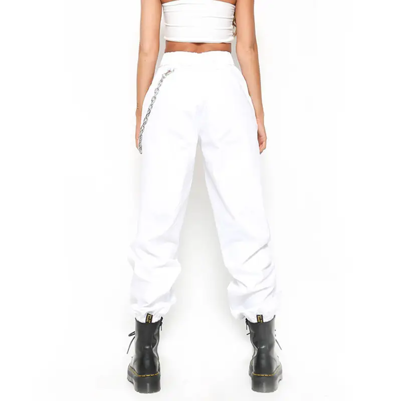 Women's White Crossbody Belt Pants with Black Boots — feature 9