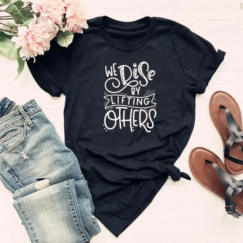 Women Black T-Shirt "We Rise By Lifting Others" Casual Wear