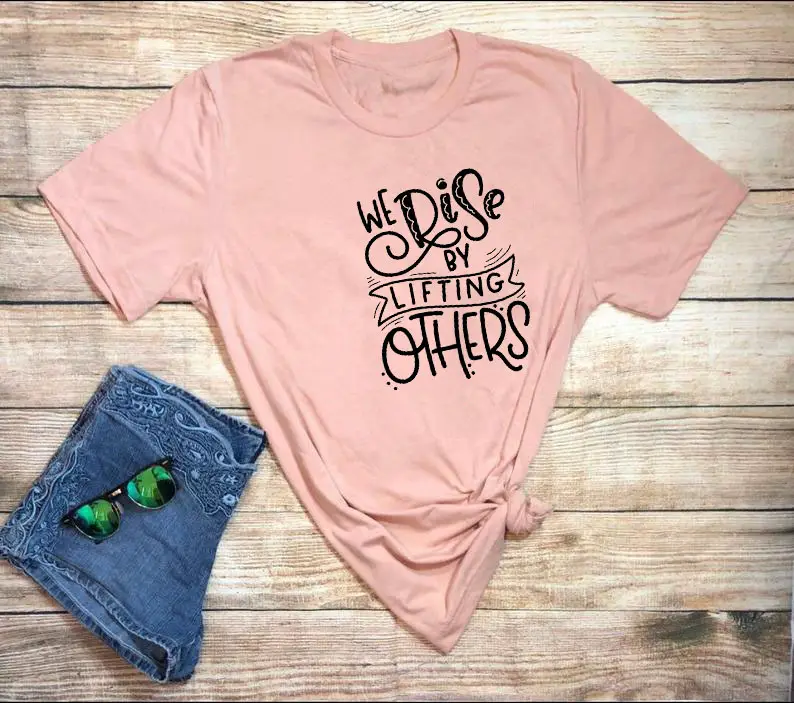 Women Black T-Shirt "We Rise By Lifting Others" Casual Wear