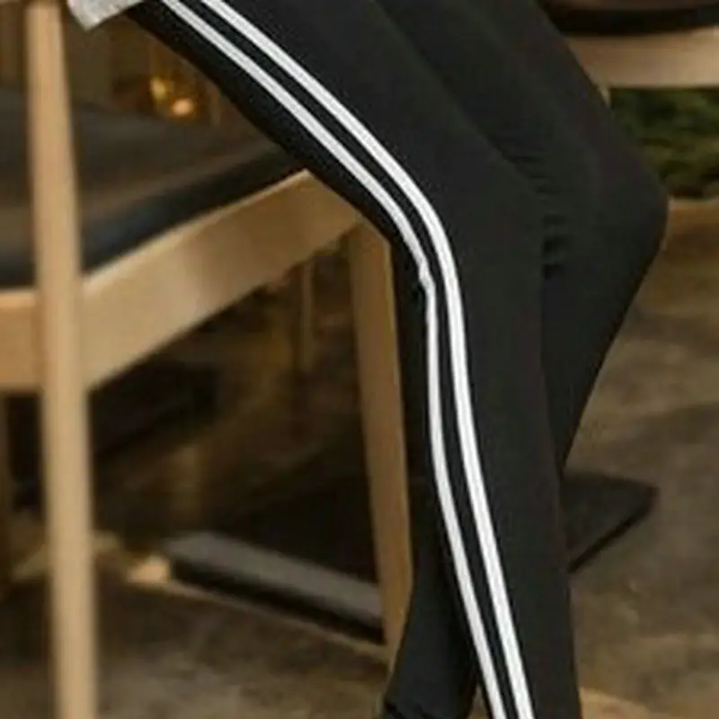 Grey Cropped Leggings with White Stripes - Image 7