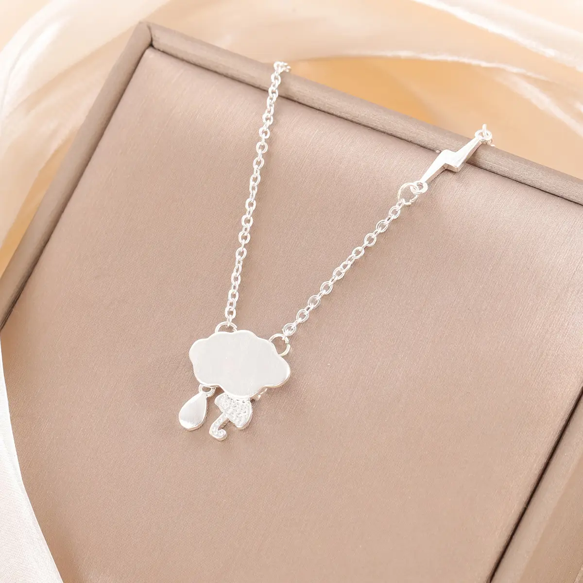 Women's Brushed Cloud Necklace with Raindrops & Lightning Design - Image 2