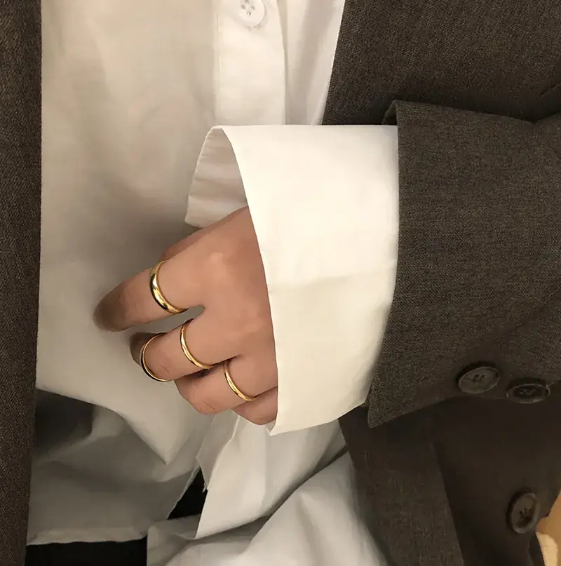 Women's Curved Glossy Titanium Ring with Gold Plating - Image 2