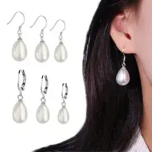 Asymmetric Star Ear Chain with Tassel & Cross Earrings — feature 5