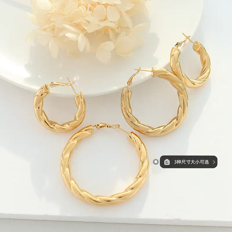 French Style Hollow Gold Earrings with Titanium Plated - Image 9