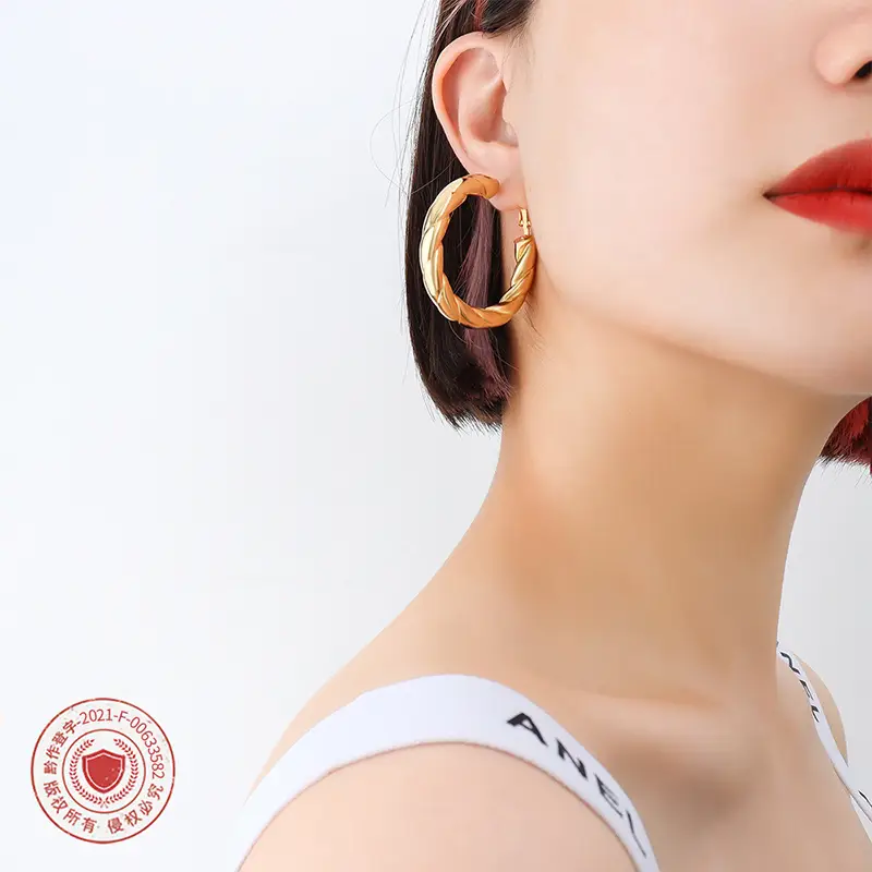 French Style Hollow Gold Earrings with Titanium Plated - Image 10