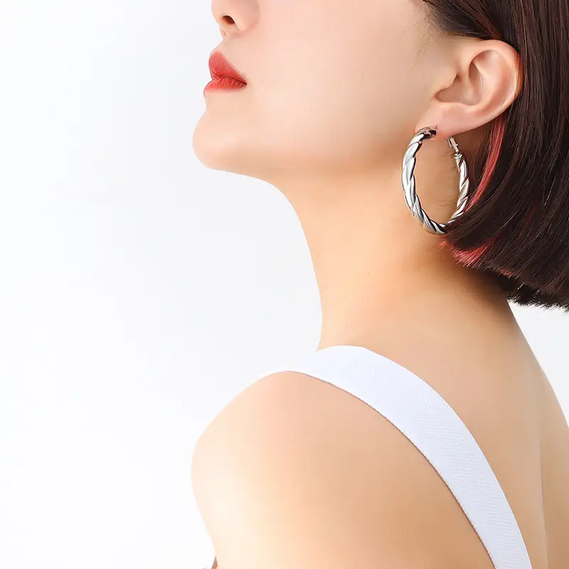 French Style Hollow Gold Earrings with Titanium Plated - Image 3