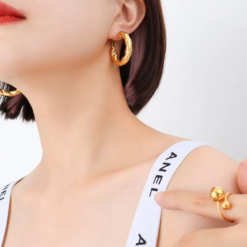 French Style Hollow Gold Earrings with Titanium Plated - Image 4