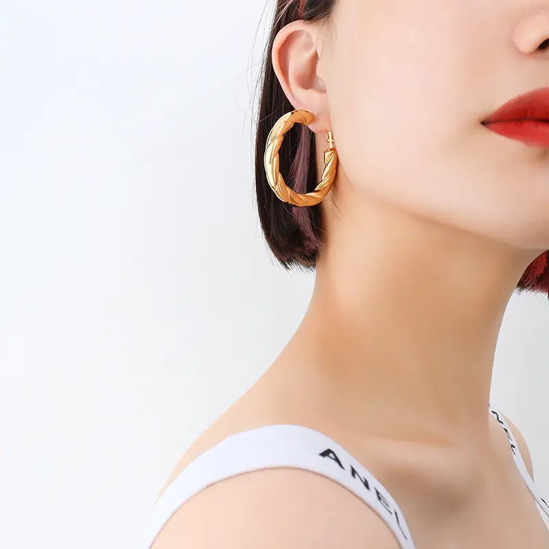 French Style Hollow Gold Earrings with Titanium Plated - Image 5