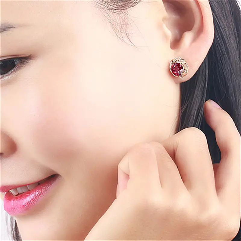 3 Karat Rose Gold Earrings with Rotating Red Tourmaline