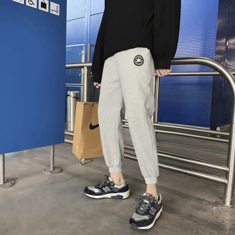 Men Korean Style Loose Leg Pants Black White Sneakers - Image 4