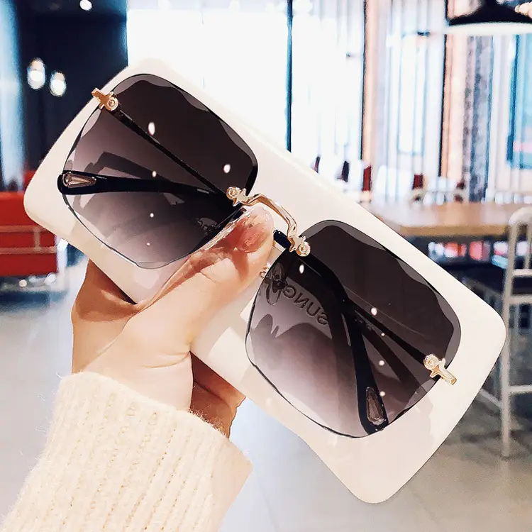 Women's Edge-Cut Rimless Sunglasses with UV Protection