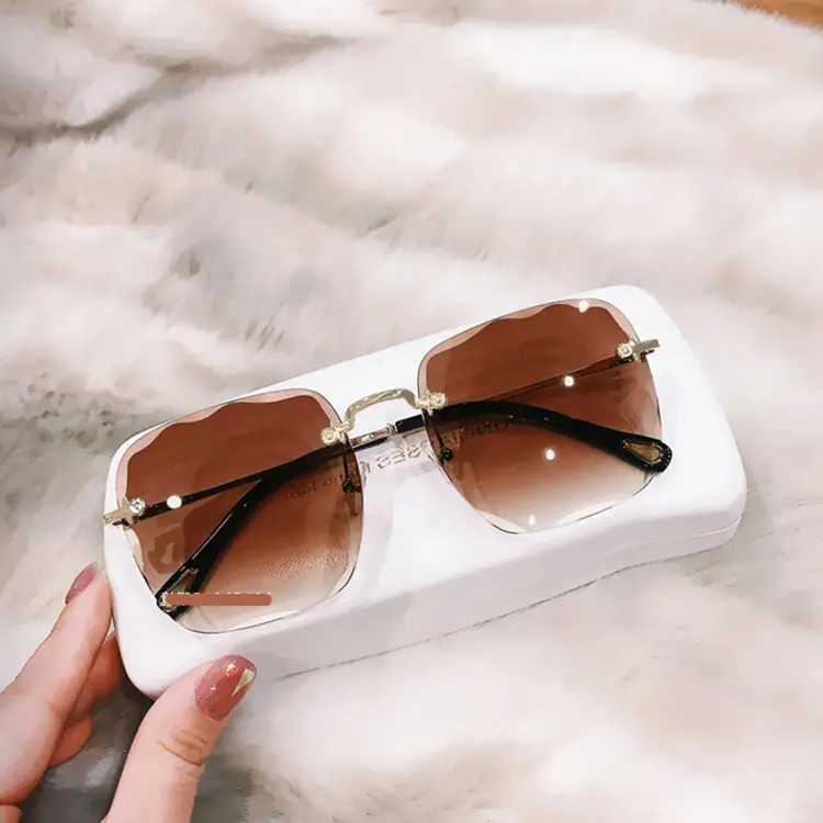 Women's Edge-Cut Rimless Sunglasses with UV Protection