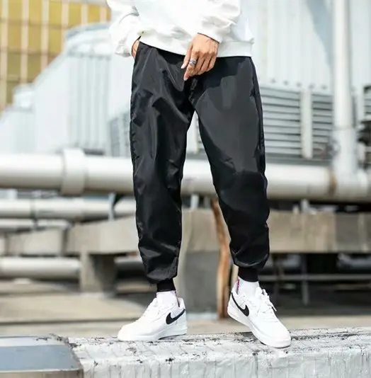 Men Black Side Zipper Hip Hop Pants with White Sneakers - Image 2