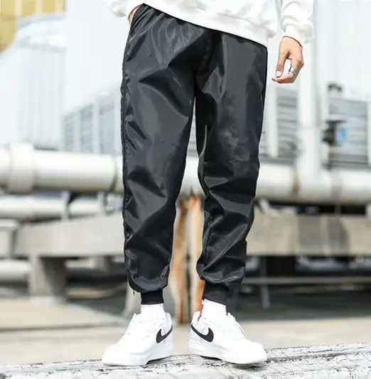 Men Black Side Zipper Hip Hop Pants with White Sneakers — feature 11