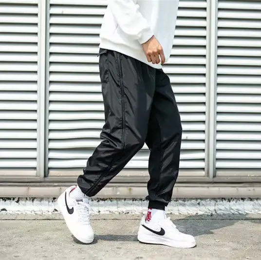 Men Black Side Zipper Hip Hop Pants with White Sneakers — feature 5
