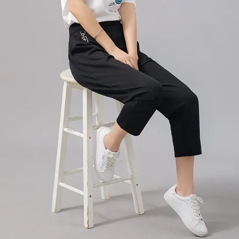 Women Cropped Pants with Metal Embellishments Solid Color - Image 4